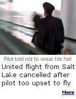 Crewmembers from another United flight chided the pilot for wearing his hat. United's pilots union has been urging pilots to remove their hats when they ''are likely to be viewed by management,'' as a form of protest.